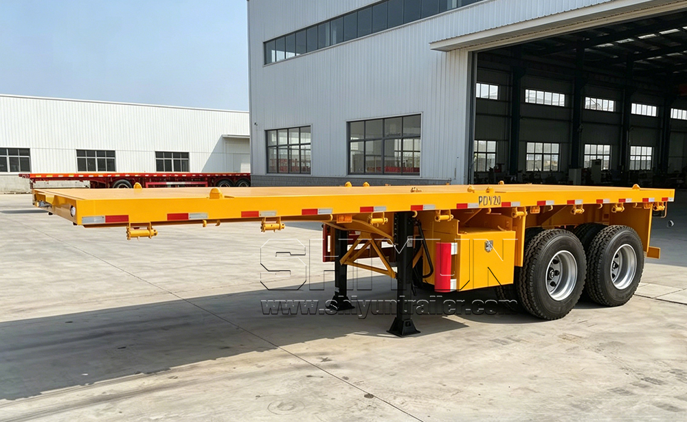 Yellow flatbed semi trailer