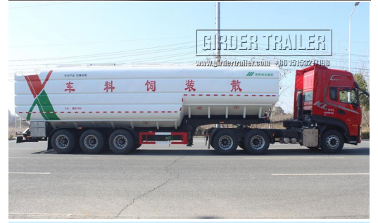 White bulk feed trailer with green red logo