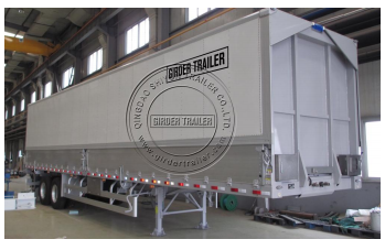 Wing van trailer in warehouse