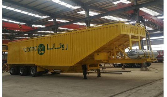 Yellow hopper trailer full side view