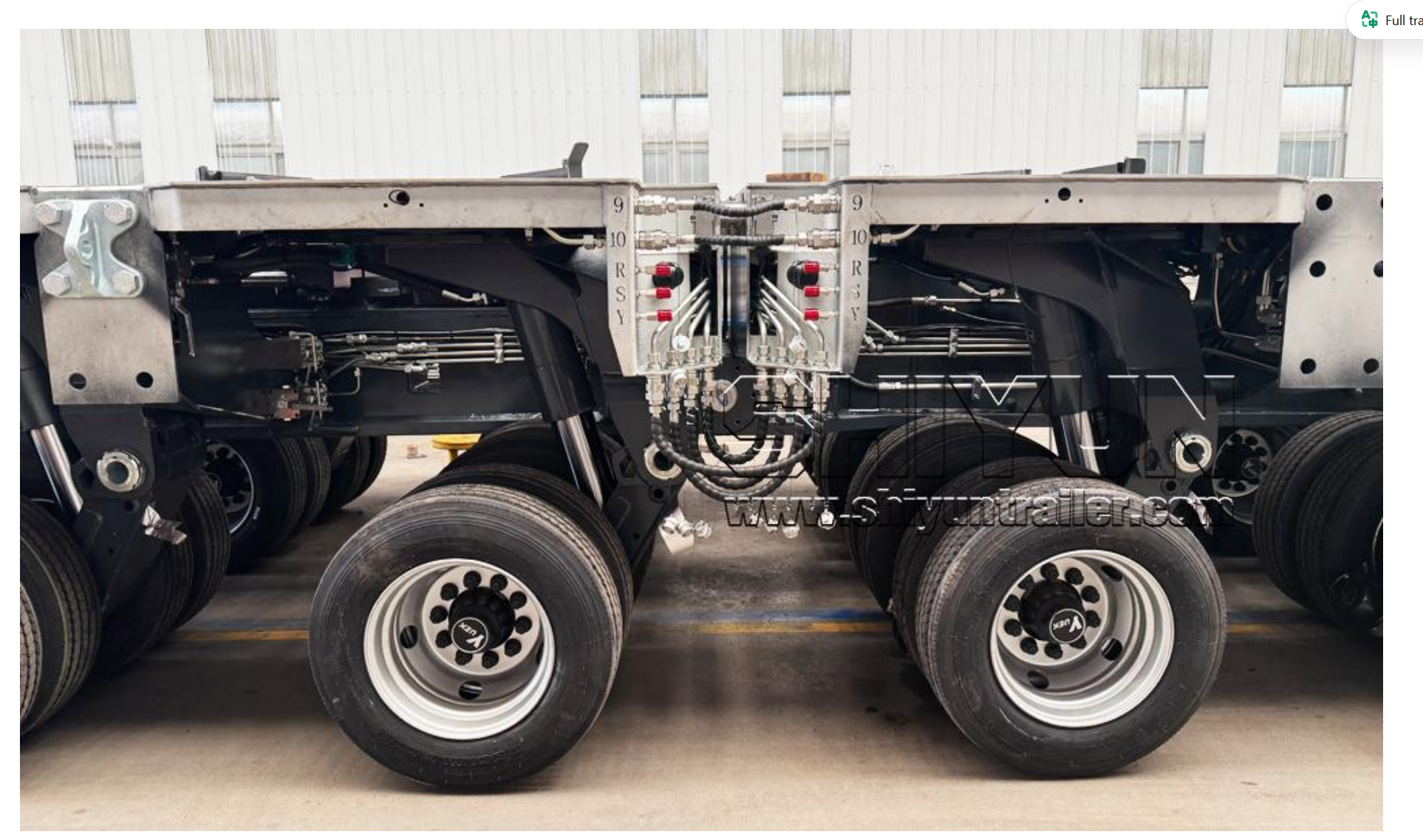 Axle line hydraulic assembly close-up, wheel hubs