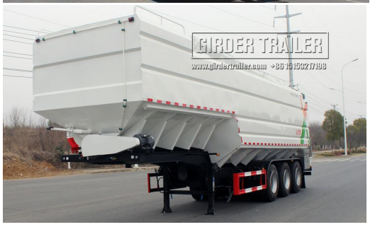 White bulk feed trailer discharge chute view