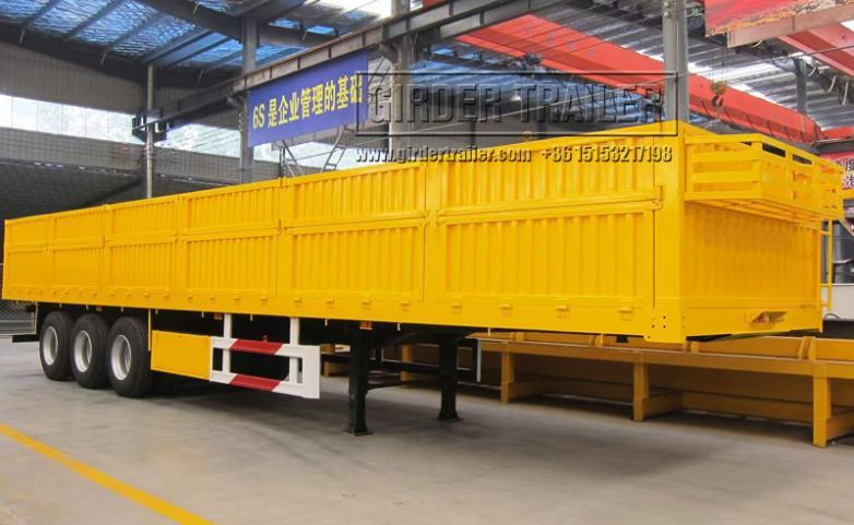 Yellow drop side semi trailer
