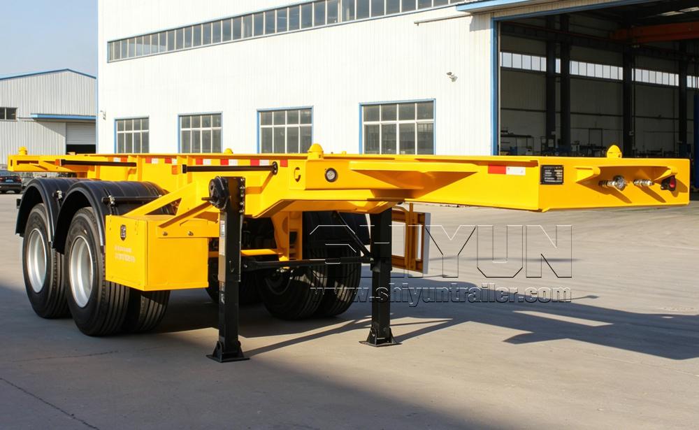 Skeleton semi trailer at factory building