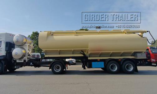 Tan bulk feed trailer side view