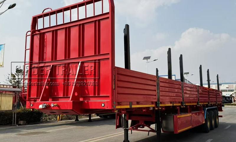 Dropside type log trailer red with bolsters