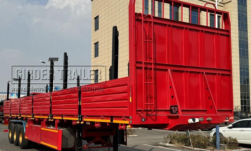 Dropside type log trailer red side view