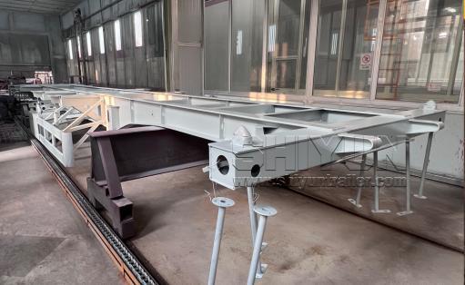 Skeleton trailer frame in workshop