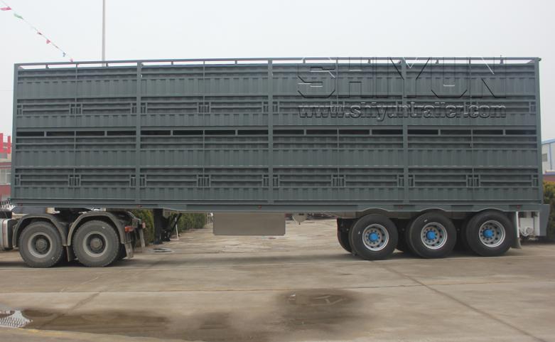 Four deck livestock trailer gray side view