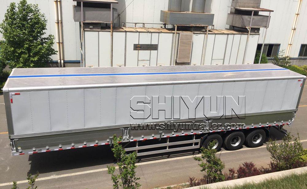 Wing van trailer parked gray