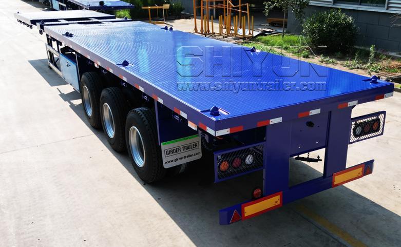 Length extendable flatbed trailer chassis