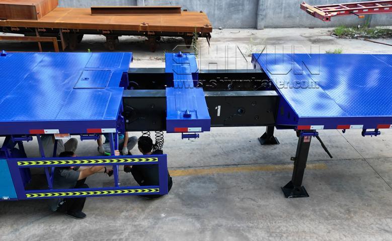 Length extendable flatbed trailer extended