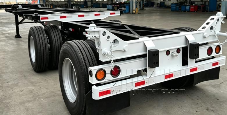 Length extendable sliding container trailer chassis