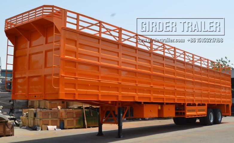 Orange fence dump semi trailer