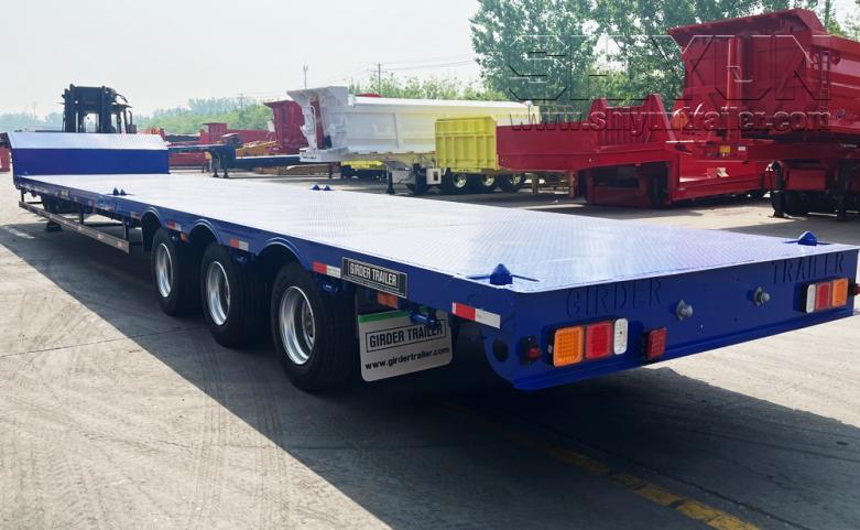 Step wise low flatbed trailer with dump body