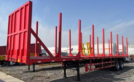 Flatbed trailer with side bars stakes red for logs