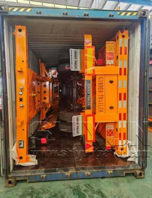 Orange trailer component packed inside shipping container