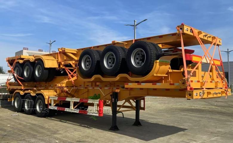 Orange skeleton trailers stacked with tires for RoRo shipping