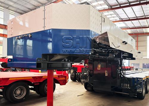 Long load turntable trailer with cargo box