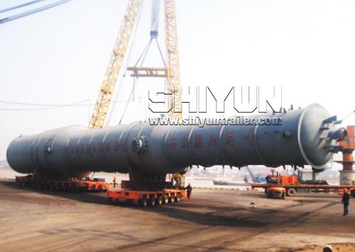 Girder trailer transporting large pressure vessel