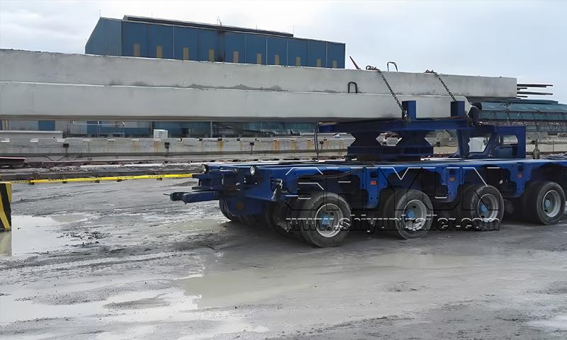 Girder trailer transporting precast beam