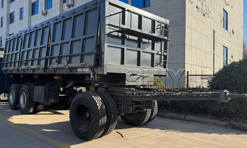 Dump draw bar trailer, dark tipper body loaded