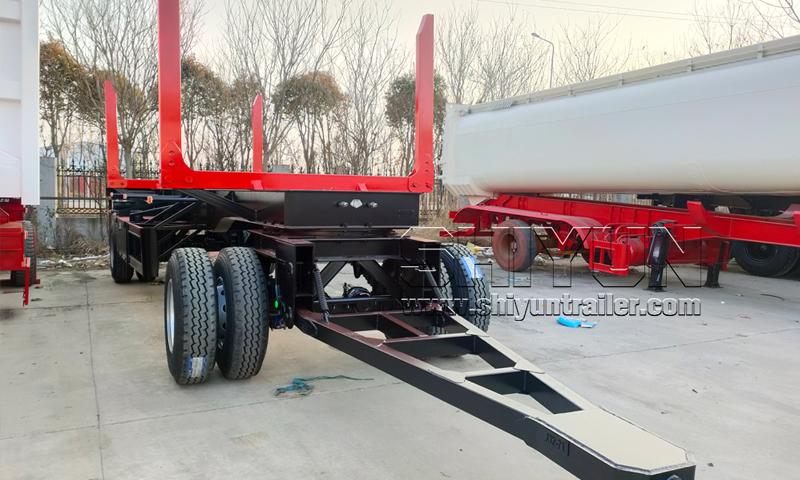 Log draw bar trailer with log bunks